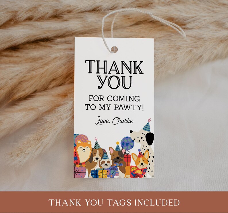 May include: A white gift tag with the text "THANK YOU" in black. Below, it reads "FOR COMING TO MY PAWTY! Love, Charlie." The bottom features cartoon dogs wearing party hats. The tag is strung with white twine.
