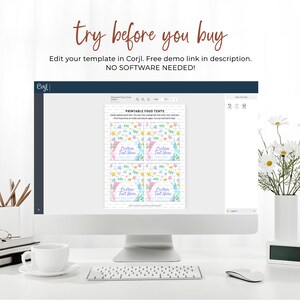 May include: A computer screen displaying a printable food tent template with a pastel blue, pink, and yellow color scheme. The template features a mermaid and starfish design with the text "Custom Text Here". The screen is on a white desk with a cup of coffee, pencils, and a keyboard.