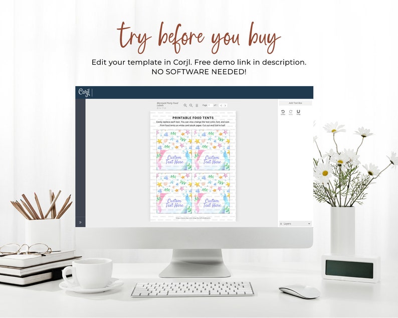 May include: A computer screen displaying a printable food tent template with a pastel blue, pink, and yellow color scheme. The template features a mermaid and starfish design with the text "Custom Text Here". The screen is on a white desk with a cup of coffee, pencils, and a keyboard.
