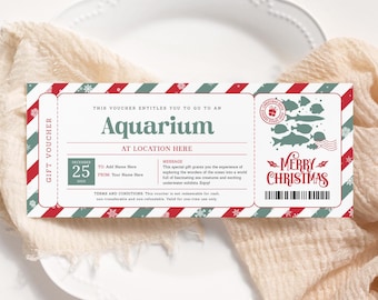 May include: A red and white striped gift voucher with a green border. The voucher is for a visit to an aquarium. The voucher has a message that says "Merry Christmas".
