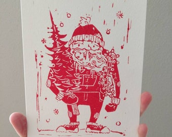 Papá Noel trabajador; decoraciones navideñas; Papá Noel; vacaciones; luces navideñas
