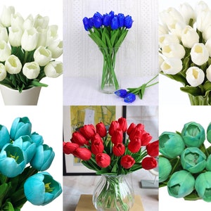 May include: A set of ten artificial tulip flower stems in various colours, including white, blue, red, and green. The tulips are arranged in bouquets and displayed in vases.