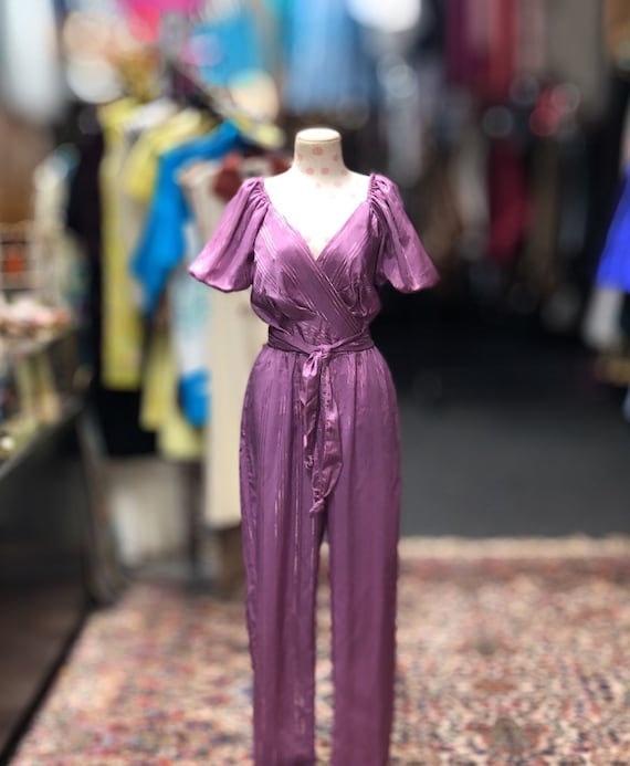 70s purple jumpsuit with gold stripes matching tie