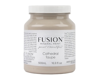 May include: A jar of Fusion Mineral Paint in the colour "Cathedral Taupe." The jar is a light beige colour with a white lid. The label includes the brand name, paint type, colour name, and volume of 500ml.