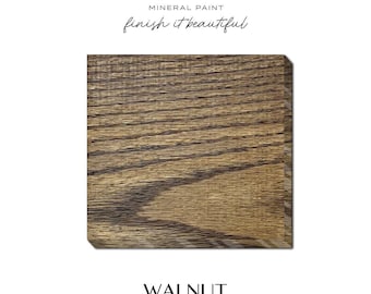 May include: A square wooden sample with a walnut finish. The wood grain is visible, with a mix of light and dark brown tones. The sample is labeled "WALNUT" below the Fusion Mineral Paint logo.