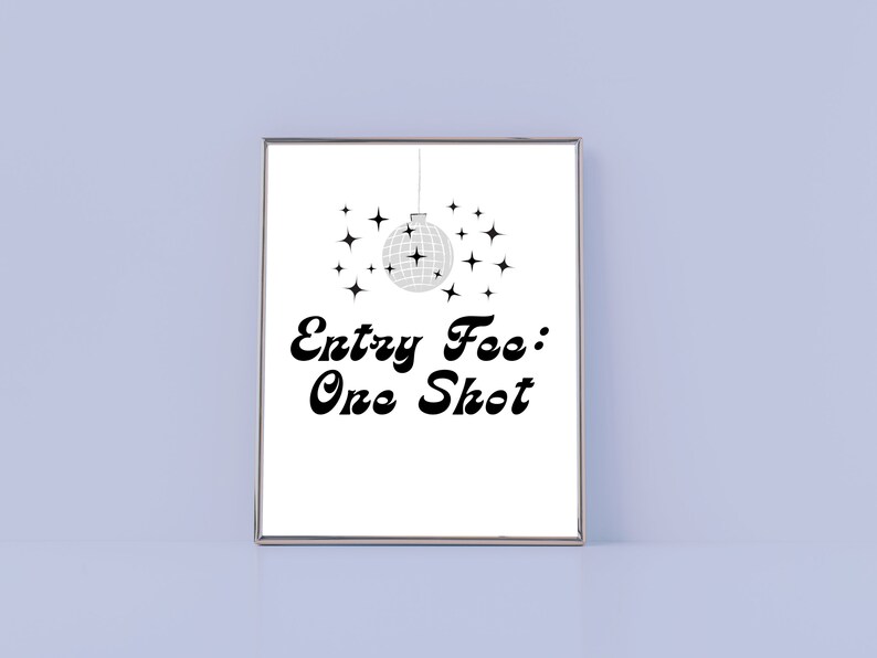 Featuring a disco ball design and the message Entry fee: one shot in fun and playful fonts, this sign is sure to get your party started. It's perfect for use as a bar cart accessory or a standalone print, and it will add some disco flair.