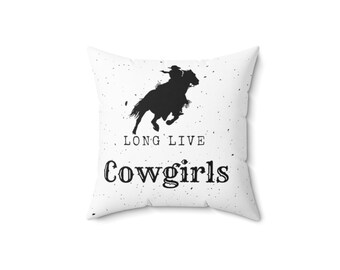 May include: White throw pillow with a black silhouette of a cowgirl riding a horse. The text "Long Live Cowgirls" is printed in black below the image.