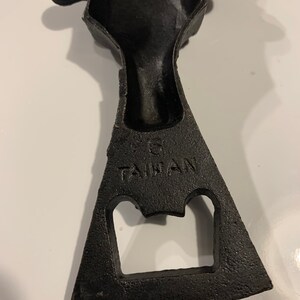 Interesting/unusual bull head cast iron bottle opener - made in Taiwan.