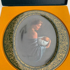 Irene Spencer - “Miracle” - part of the Mothers Love series.  Very nice collectors plate!
