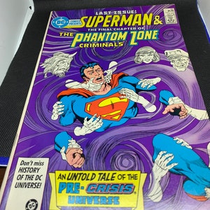 May include: A comic book cover featuring Superman in a purple and white swirling background. The cover text reads "Last Issue! Superman & The Final Chapter of The Phantom Zone Criminals".