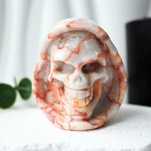 Red Network Stone Crystal Skull: Natural Carved Healing Stone