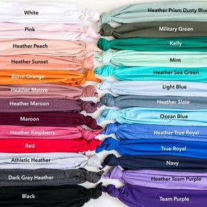 a large group of different colors of t - shirts