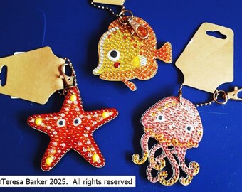 Hand decorated crystal art keyring, keyring, key chain, key fob, sealed crystals, fish, star fish and jelly fish, clip attached, useful gift
