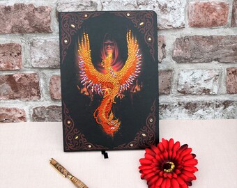Hand decorated crystal art hard covered notebook with a Phoenix on it