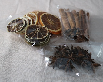 dehydrated fruits, cinnamon sticks, star anise, dried chillies, dehydrated orange, lemon and limes slices, potpourri mix, Christmas mix