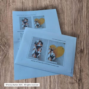 May include: A sewing pattern for a poppered glasses case. The pattern includes images of the finished product, featuring a dog print and a yellow heart. The text "PATTERN NUMBER # 1054" is visible. Copyright Teresa Barker 2025.