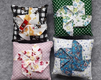 Handmade origami style pin cushion that also takes clips
