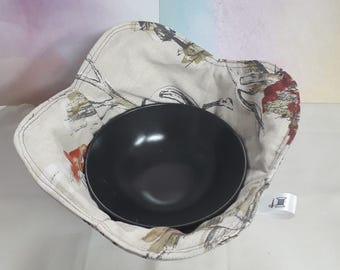 Bowl holder that is ideal for using in a microwave.  No need for anymore burnt figures.  Made from 100% cotton fabric. Fully reversable.