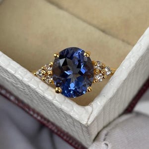 ハンドメイドのスターリングシルバータンザナイトリング：CZアクセント、ステートメントジュエリー