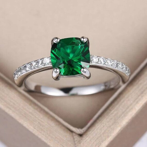 Contemporary emerald deals ring