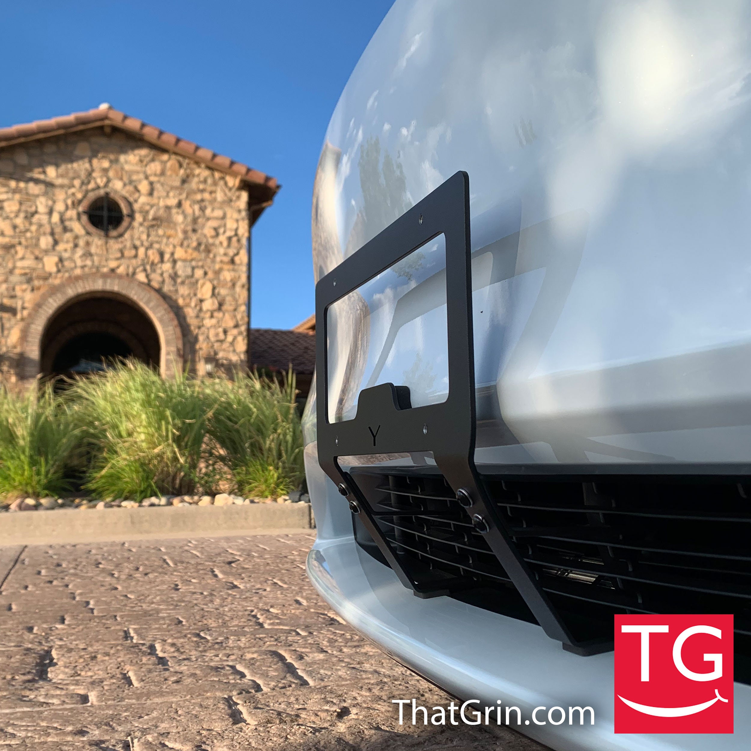 Tesla Model Y Protected Front License Plate Frame Mountthatgrin™ Slipstream Bracket® Metal
