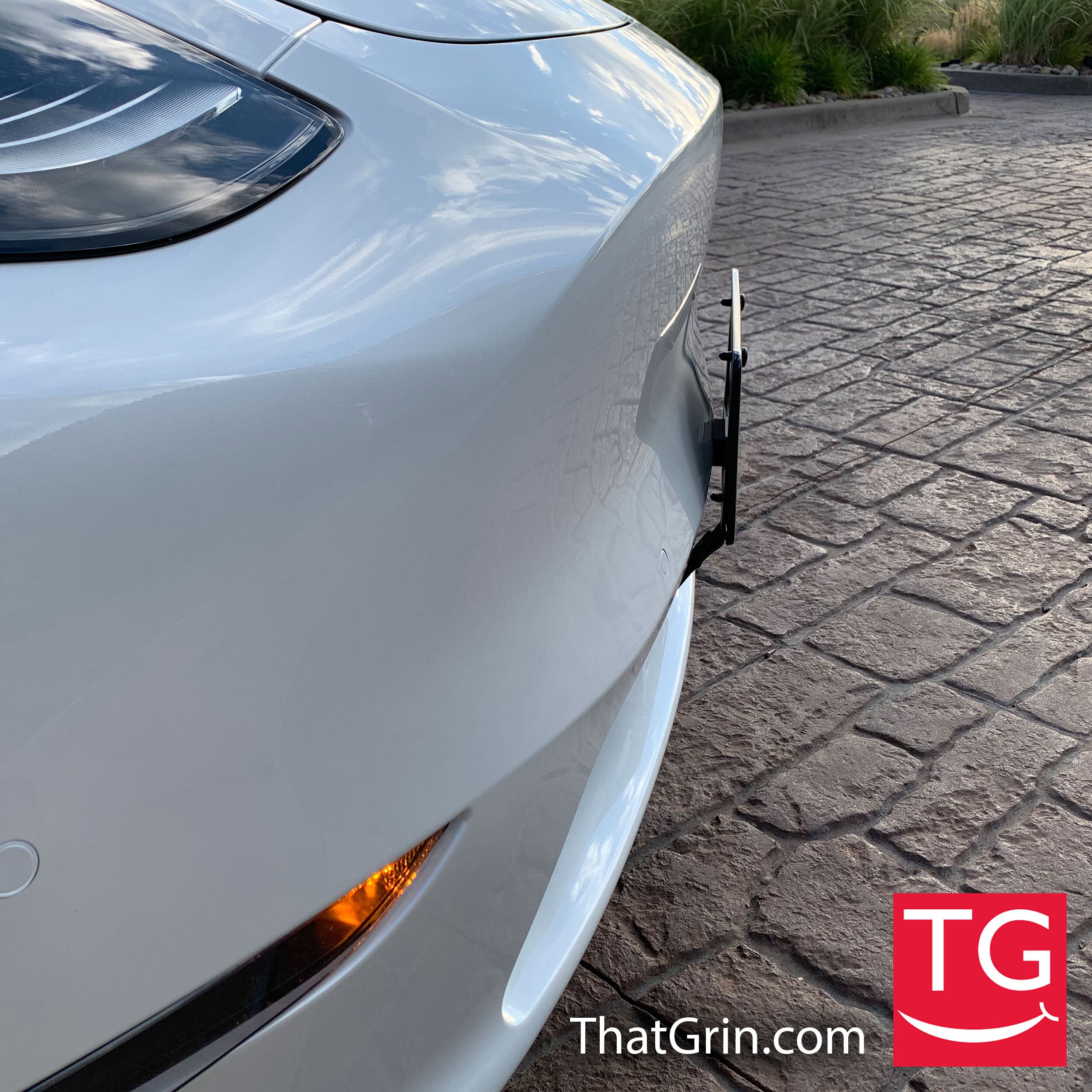 Tesla Model Y Protected Front License Plate Frame Mountthatgrin