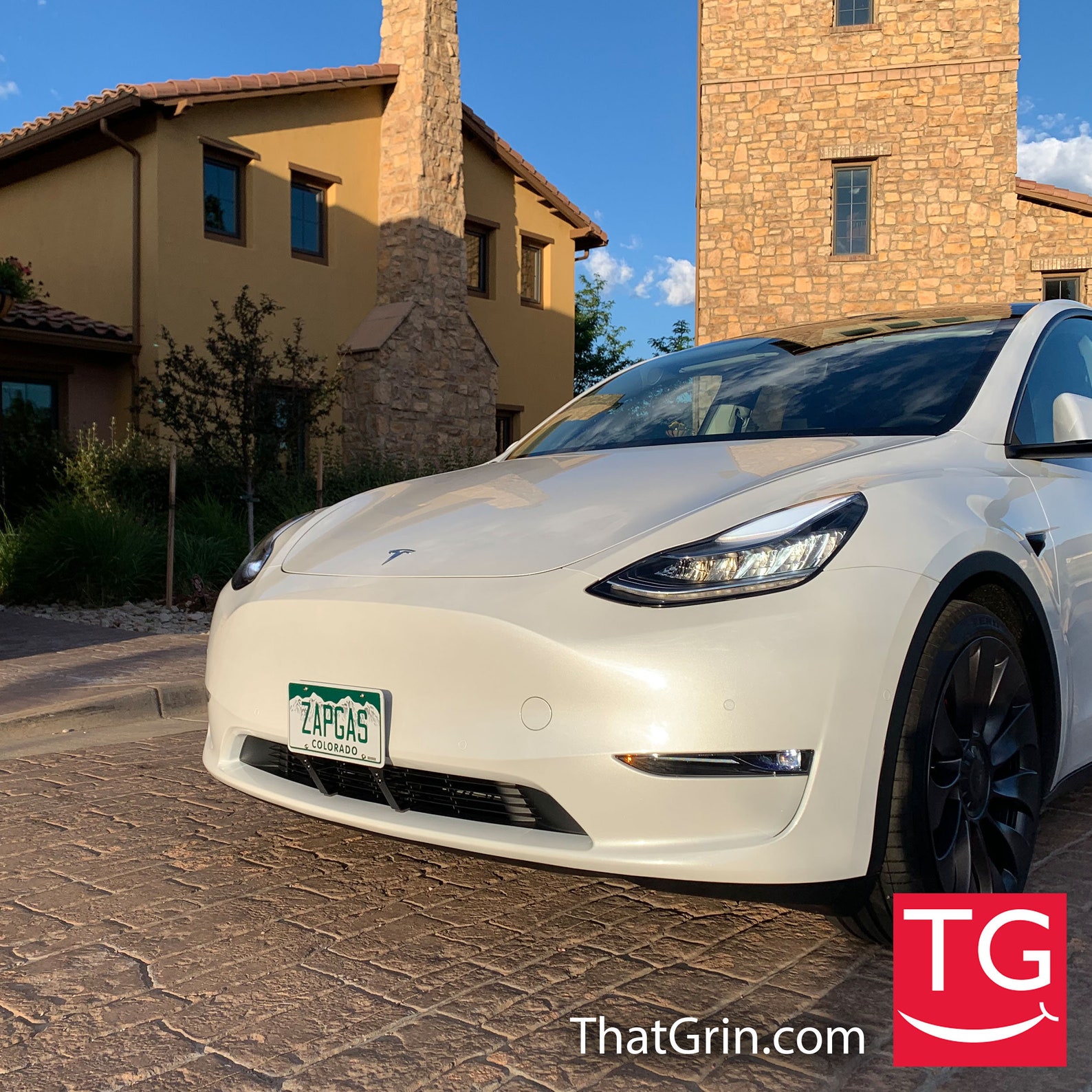 Tesla Model Y Protected Front License Plate Frame Mountthatgrin