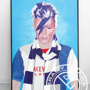 May include: A digital illustration of David Bowie wearing a white and blue soccer jersey with a blue and white scarf. The jersey has the text "MCEV LAC" on the front. The background is a light blue color.