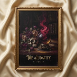 May include: A framed rectangular print featuring a human skull, a cluster of dark red and cream roses, and a crystal ball emitting pink flames. The text "The Audacity" is printed in gold at the bottom of the dark, atmospheric illustration.