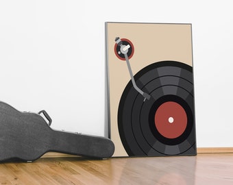 May include: A framed print of a vintage record player with a black vinyl record and a red label. The record player is on a beige background.