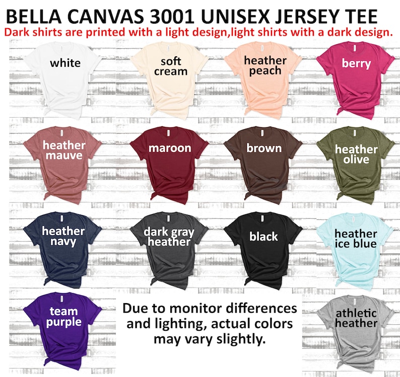 May include: A chart displaying 14 different Bella Canvas 3001 Unisex Jersey Tee shirt colours. The colours include white, soft cream, heather peach, berry, heather mauve, maroon, brown, heather olive, heather navy, dark grey heather, black, heather ice blue, team purple, and athletic heather. The text "Dark shirts are printed with a light design, light shirts with a dark design." is at the top of the chart.