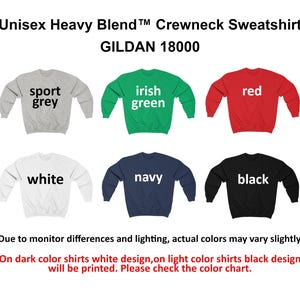 May include: Unisex Gildan 18000 heavy blend crewneck sweatshirt in various colors, including sport grey, irish green, red, white, navy, and black. The text "Unisex Heavy Blend Crewneck Sweatshirt Gildan 18000" is at the top of the image. The text "sport grey", "irish green", "red", "white", "navy", and "black" are printed on each sweatshirt. The text "Due to monitor differences and lighting, actual colors may vary slightly." is at the bottom of the image. The text "On dark color shirts white design, on light color shirts black design will be printed. Please check the color chart." is at the bottom of the image.
