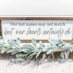 Our Last Names May Not Match Sign
