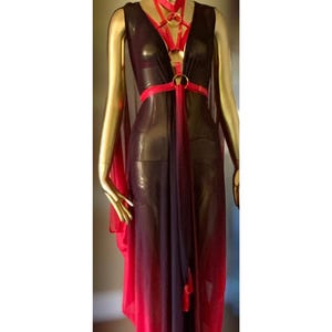 sachin and babi light blue dress This ultra chic Christian Dior black silk with leather bondage straps  bias-cut gown dates back to John Galliano’s epic 2001 spring/summer  collection. For this body of work Galliano explored themes of