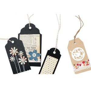 May include: Three gift tags with twine. One black tag with a floral design, one black tag with gold polka dots, and one brown tag with a white bird design and floral patterned tape.