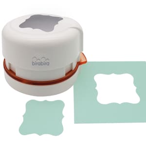 May include: White paper punch with a light orange base. The punch creates a decorative, scalloped square shape. A sample of the punched shape is shown in light green paper.