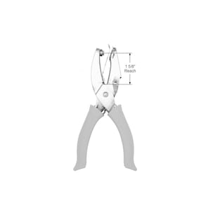 May include: A silver metal hole punch with light gray ergonomic handles. The tool features a visible measurement indicator showing a 1 5/8 inch reach from the center of the punch to the edge of the frame, designed for precise paper punching tasks.