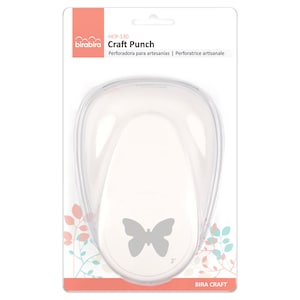 May include: White plastic craft punch with a butterfly design. The punch is packaged on a white and pink background with the text "birabira Craft Punch" and "Perforadora para artesanias | Perforatrice artisanale".