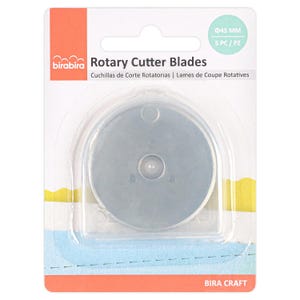 May include: A pack of rotary cutter blades. The packaging is white and orange, with the brand name "birabira". A clear plastic window displays a silver circular blade. The text "Rotary Cutter Blades" is printed on the packaging. The blade is 45mm in diameter.