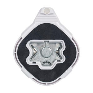 May include: White plastic base with a black rubber insert and a silver metal center. The base has a raised design on the top and a small hole in the center.