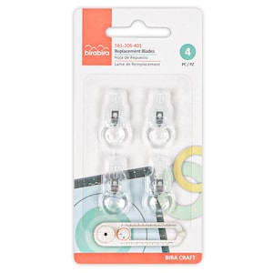 May include: Package of four clear plastic replacement blades for a circle cutter. The package has the text "561-206-401 Replacement Blades" and "4 PC/PZ" on it.