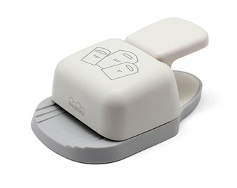 May include: A white and grey paper punch with a handle. The punch is designed to create three different sizes of gift bag shapes. The punch is labelled "birabira" and has a measurement guide on the bottom.
