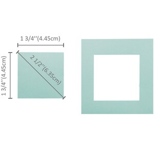 May include: A light blue square card with a white border and a diagonal line measuring 2 1/2 inches (6.35 cm). The card is 1 3/4 inches (4.45 cm) wide and 1 3/4 inches (4.45 cm) tall.