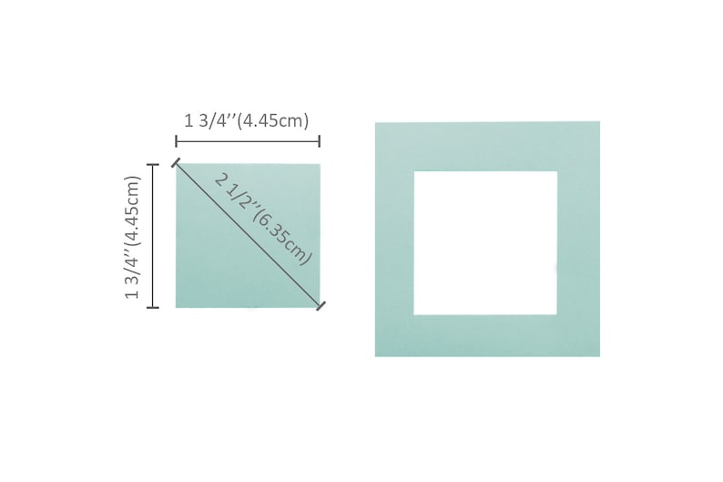 May include: A light blue square card with a white border and a diagonal line measuring 2 1/2 inches (6.35 cm). The card is 1 3/4 inches (4.45 cm) wide and 1 3/4 inches (4.45 cm) tall.