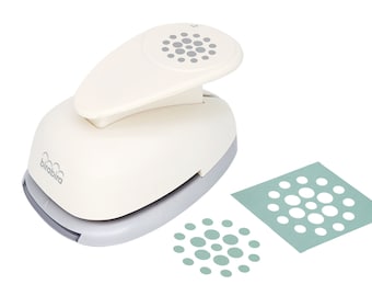 May include: White paper punch with a gray base. The punch creates a pattern of small circles. The punch is labeled "birabibra".
