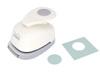 May include: A white and gray circle punch with the brand name "birabira" printed on the side. The punch is shown next to a sample of a circle punched out of a light blue piece of paper.