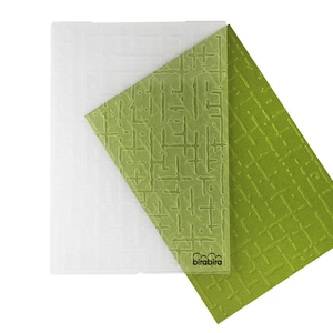 May include: Two green and white textured embossing plates for crafting. The plates are made of clear plastic and have a raised design. The larger plate has a more intricate design than the smaller plate. The smaller plate has the word "birabira" printed on it.