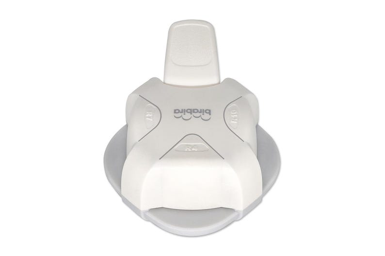 May include: White plastic paper punch with a gray base. The punch has four different sized circles to punch out. The punch is labeled "Cricut".