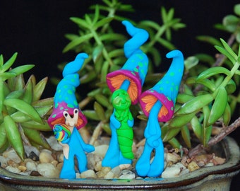 Bright, fun little Indigo Milk Cap Shrooms for you fairy garden