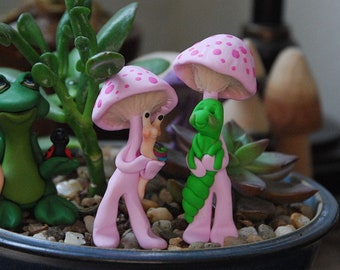 Sculpted clay little pink Felted Twiglet Shrooms with their snail and ladybug friends for your fairy garden